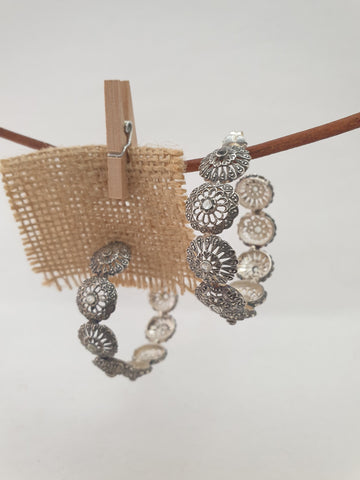 Pendientes Fernandinos aros  de 9 rosetas y piedras preciosas