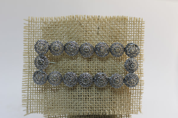 Broche Fernandino con 16 Topacios naturales